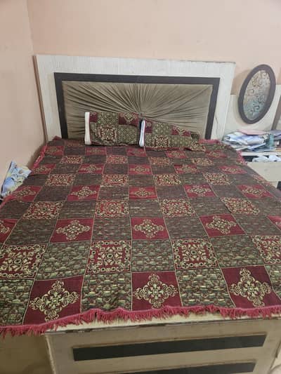 bed with mattress, dressing table and side tables