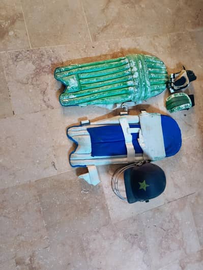 batting gloves, helmet and batting pads