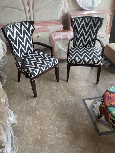 2 Elegant designer chairs