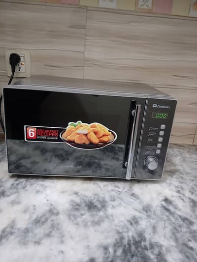 10/10 Condition Dawlance 20 Liters microwave oven Just in Rs. 17000