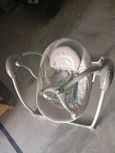 tinnies baby bouncer and swing.