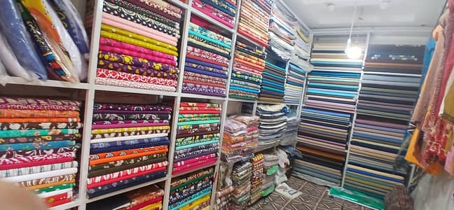 Running unstiched clothing shop for sale