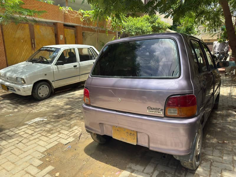 Daihatsu Cuore 2001 - Cars - 1120459691