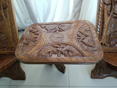 African wood engraved chairs and table