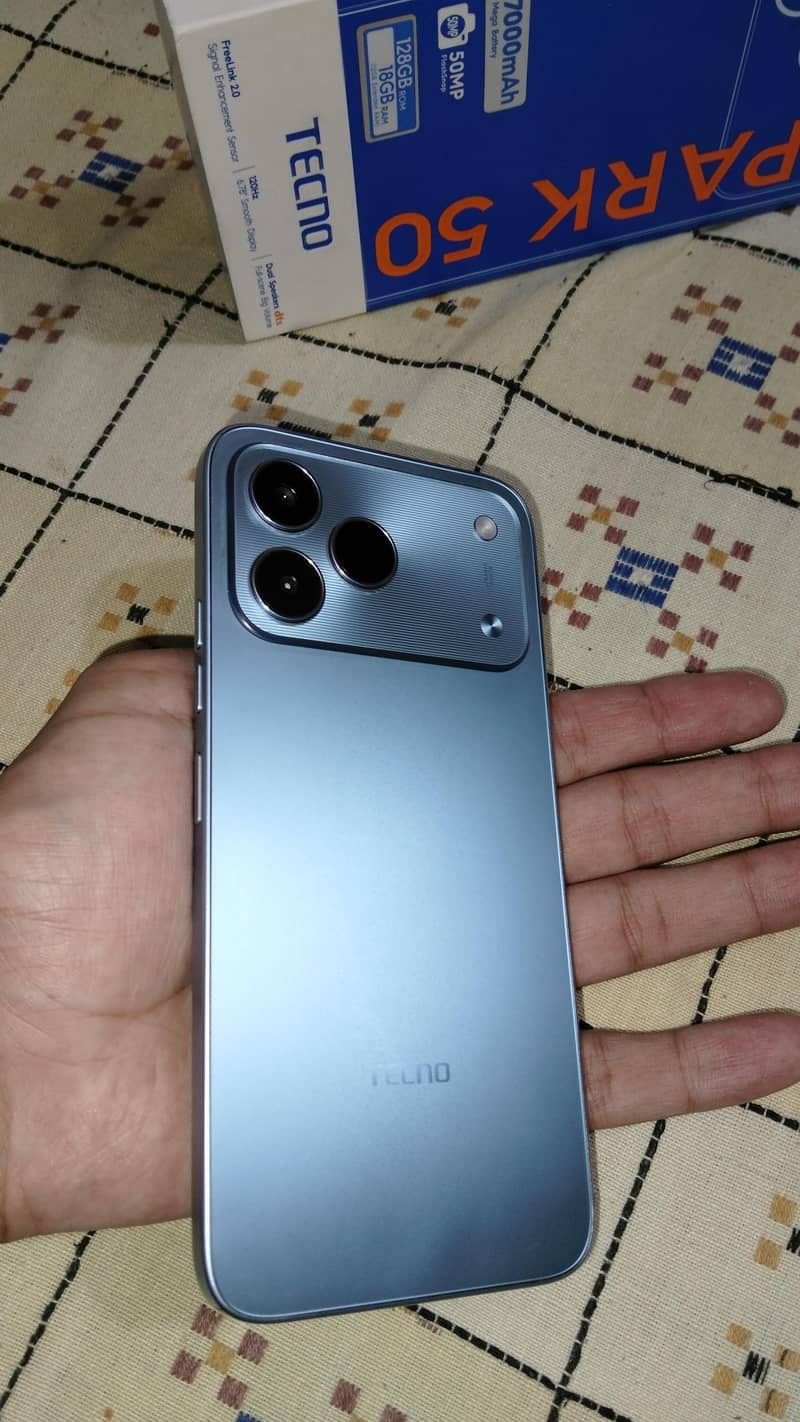 TECNO SPARK 50 1