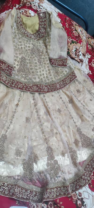 beautiful golden lehnga with fresh red heavy duppta for sale