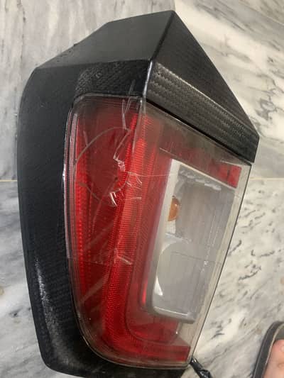 Daihatsu Mira left side back light