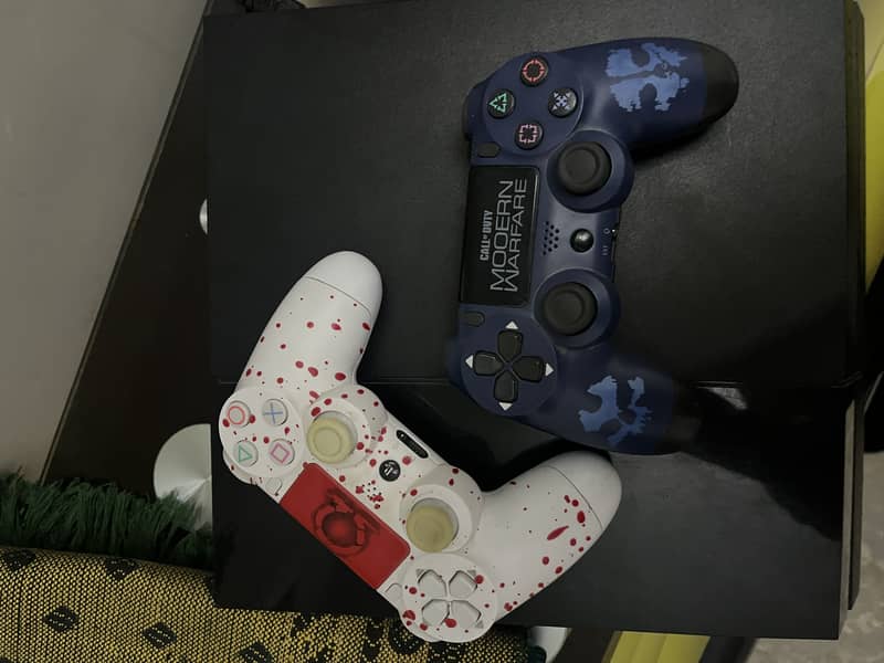 Playstation 4 with 2 controllers 1