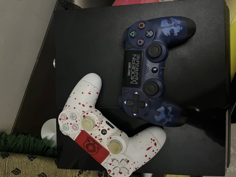 Playstation 4 with 2 controllers 2