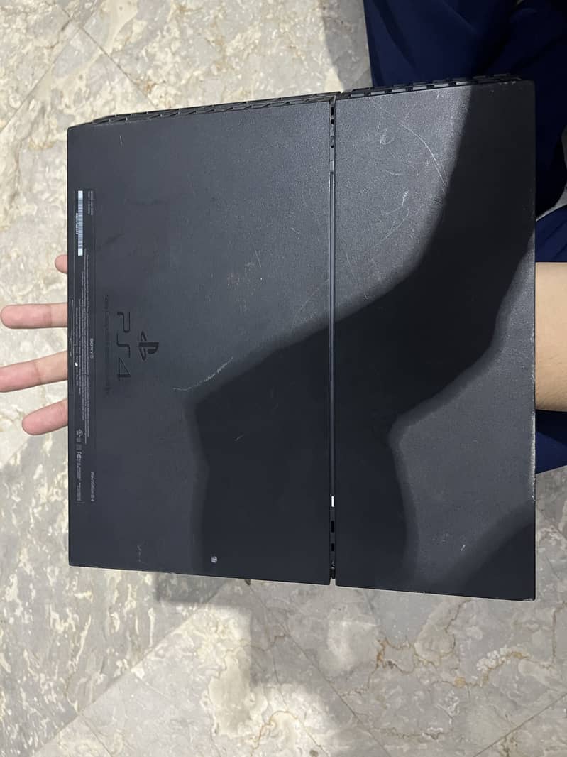 Playstation 4 with 2 controllers 3