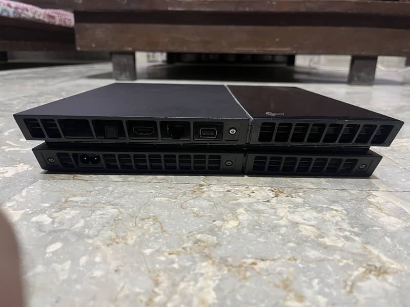 Playstation 4 with 2 controllers 6