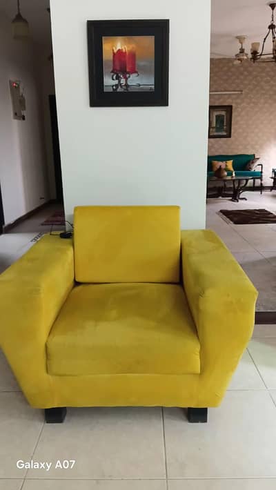corner sofa and a studio single sofa
