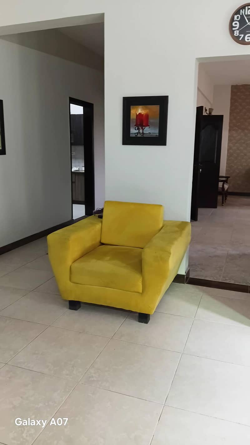 corner sofa and a studio single sofa 1
