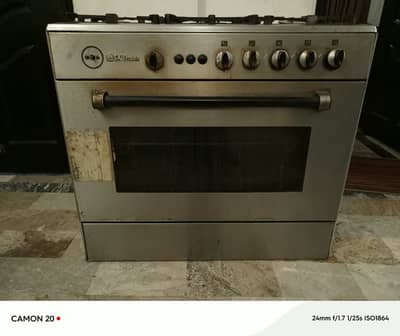freestanding Sky Flame gas cooking range with a baking oven. All okeh