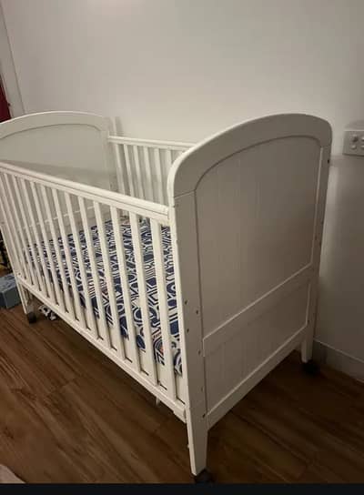 White Wooden Baby Cot