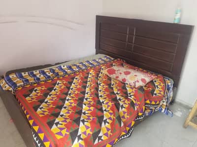 Bed with almirah
