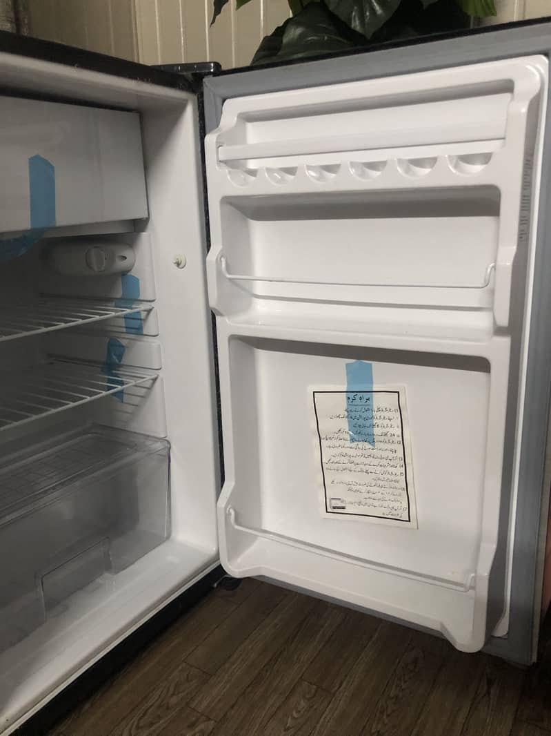 Dawlance mini fridge 10