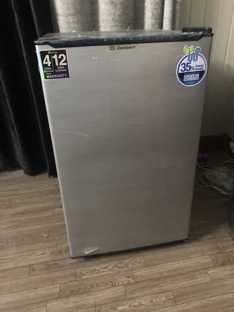 Dawlance mini fridge 12