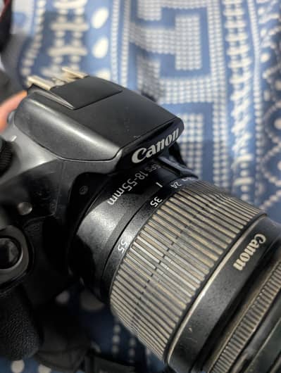 Canon 1300D with original charger and 2 battery