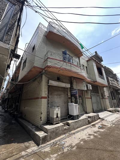 10 Marla Corner House For Sale With 2 Shops Double Storey Solid Construction