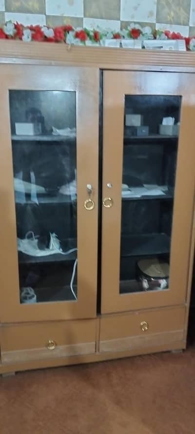 1 almari 2 dor 1 shokese almari ha used nai ki abi