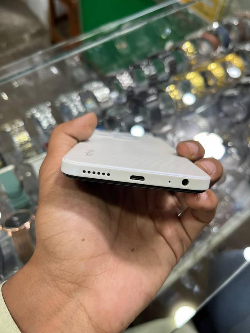 Infinix Smart 7 4