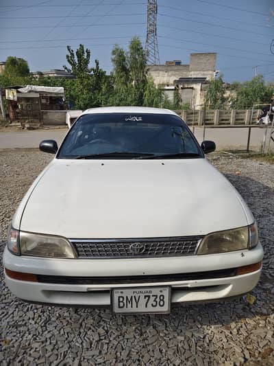 White Toyota Corolla 1997 Model