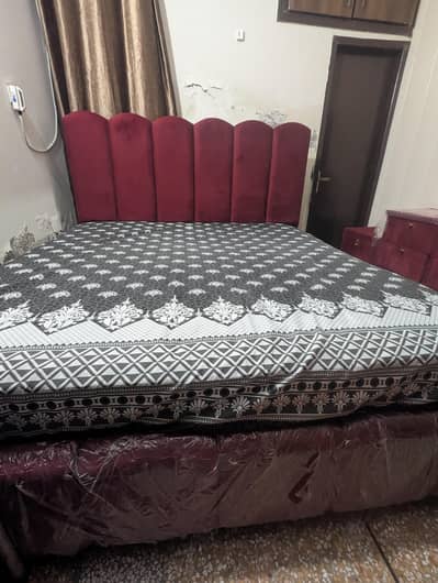 Double bed with dressing and side tables