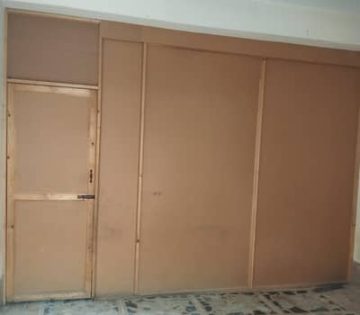 Wooden Board Partition Frame with Attached Door for Sale.