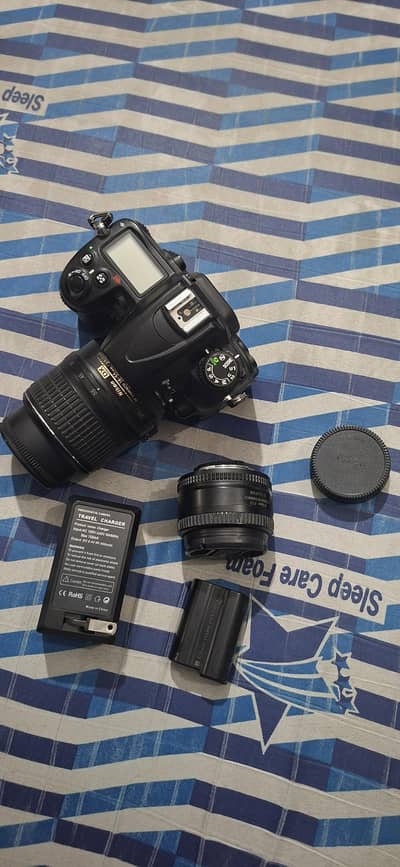 Nikon D7000 DSLR with 2 lenses and accessories