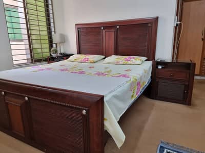 Beautiful and elegant dark-brown wooden king-size bed set available f