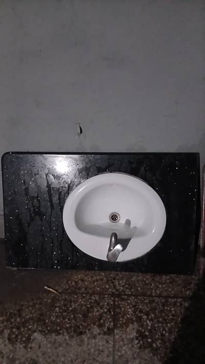 marble vanity size 2×4 ft fitted with porta basin and faisal mixer