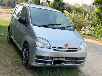 Daihatsu Mira 2004