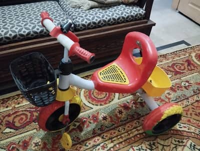 Kids try cycle and baby twister car