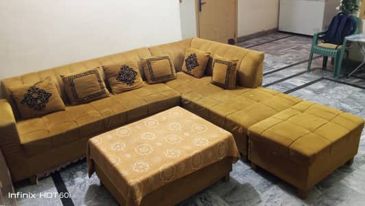 L shape sofa with Table