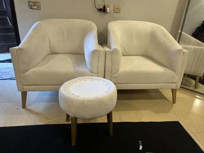 Two sofa chairs king size with coffe table available
