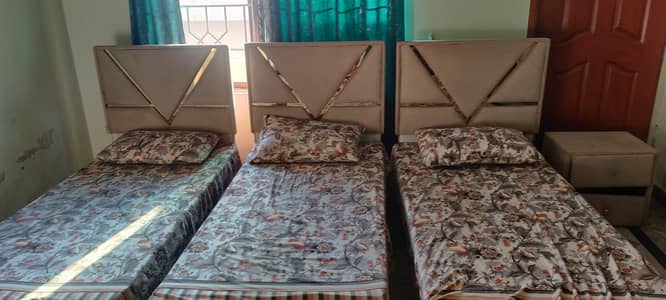 Three single beds