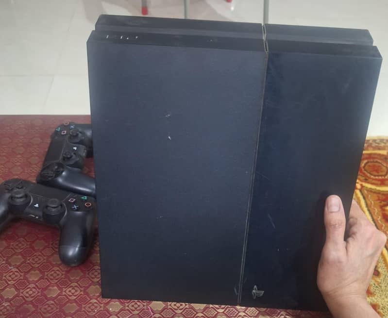 PS4 with controllers 1