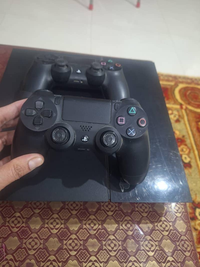 PS4 with controllers 2