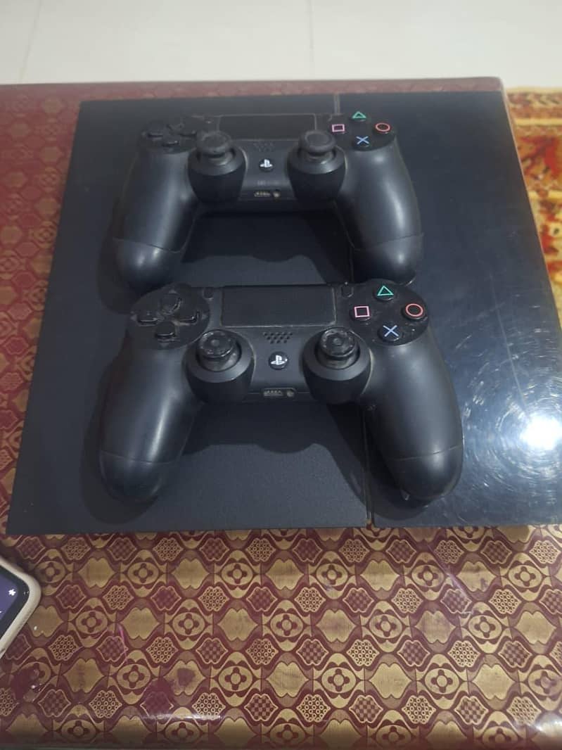 PS4 with controllers 3