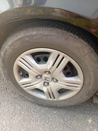 15 inches tyres and  simple rims for sale rim 10/10 condition