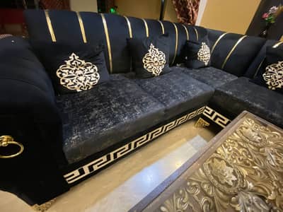 L shape Sofa set with centre table.
