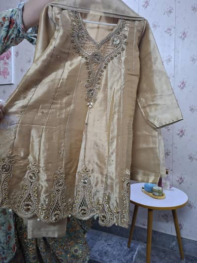 Golden embellished frock with 2 trousers to choose from.