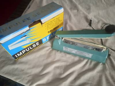 Mini Hand sealing machine 1 month use it 10 by 10 condition