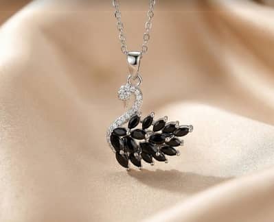 stainless steel swan neckless just in Rs 499