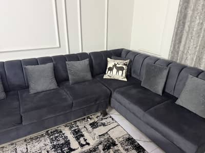 Dark grey L shaped sofa