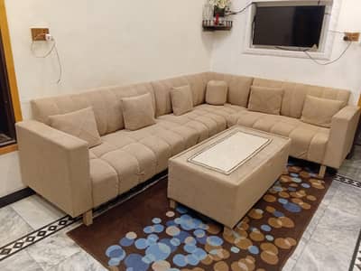 L shape 8 seater sofa with table and Dewan puffi for sale