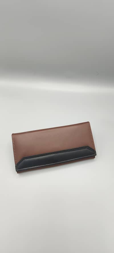 Different leather Cluthes/wallets for sale
