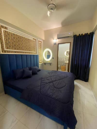 Daily Basis Apartment & Rooms Per day Perweek Short stay Available in E-11 Islamabad