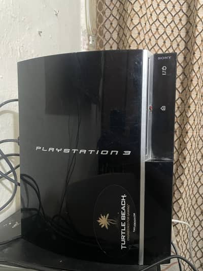 Playstaion 3 with 18 games preloaded and 2 controller with 3 dvd